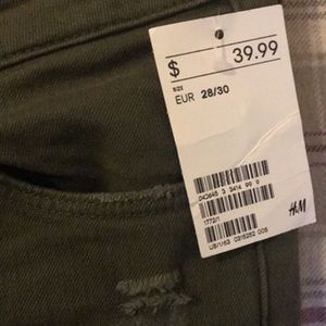 Olive green HM skinny distressed jeans